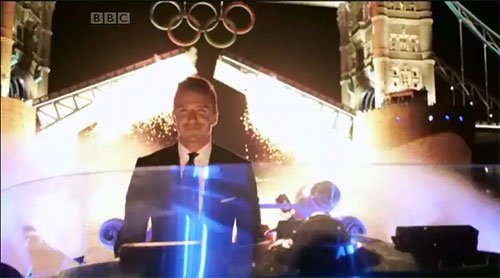 David Beckham pilots a speedboat down the Thames with the Olympic Torch David Beckham pilots a speedboat down the Thames with the Olympic Torch
