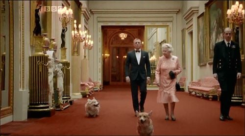 The Queen, her Corgis and James Bond on their way to the Olympic Stadium The Queen, her Corgis and James Bond on their way to the Olympic Stadium